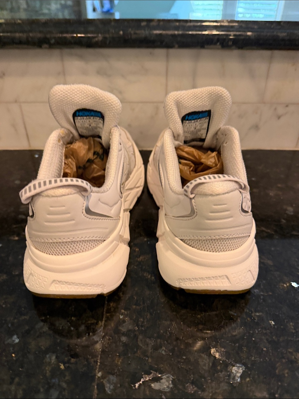 Hoka One One Women's All-White Athletic Sneakers - Picture 3 of 4